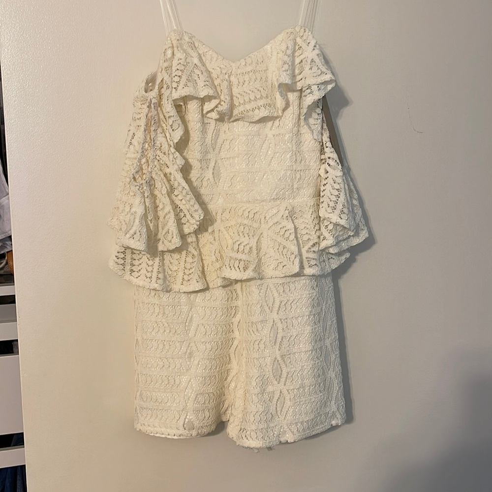 Open shoulder lace ruffle romper